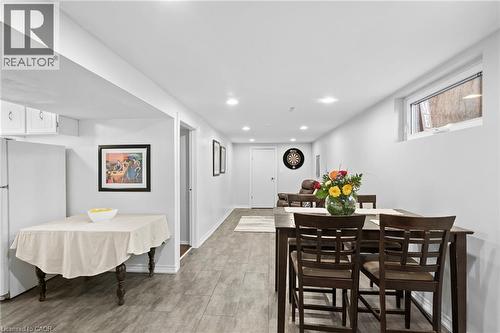 Recessed lighting illuminates this space featuring wood-finish flooring - 1083 Melton Drive, Mississauga, ON 