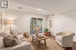 Family Room with Walkout-Virtually Staged - 