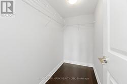 Primary Bedroom Walk In Closet - 