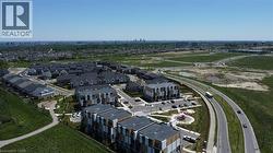 Contemporary townhome community featuring modern architectural designs and a structured layout - 