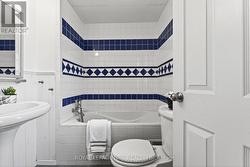 2nd floor bathroom with tub. - 