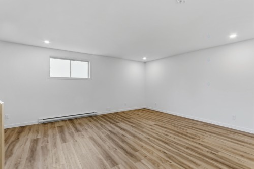 Salle familiale - 8 Rue Tougas, Châteauguay, QC - Indoor Photo Showing Other Room