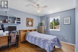 Bedroom 2 also offers wood flooring. - 