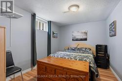 Lower level bedroom for guests or teenagers. - 