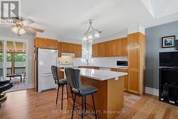 Modern kitchen with new backsplash & quartz. - 