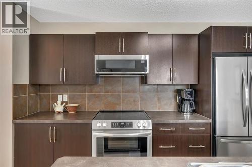 27 River Heights Crescent, Cochrane, AB 