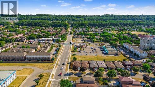 Aerial perspective showcasing a residential area with varied housing types - 102 Juniper Drive, Hamilton, ON 