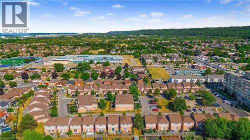 Aerial perspective showcasing a residential area with diverse housing types - 102 Juniper Drive, Hamilton, ON 
