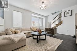 Spacious Living Room Overlooking the Front Yard - 