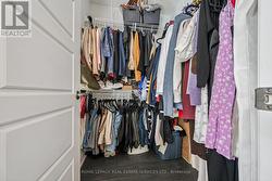 Primary Walk-In Closet - 