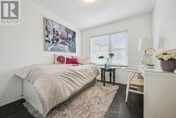 Second Bedroom with Laminate Flooring - 