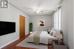 Large bedroom virtually staged as primary - 