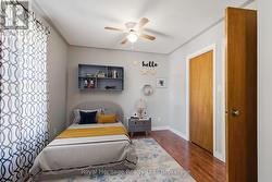 Large bedroom virtually staged as shared kids room - 