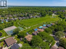 Neighbourhood park behind with tennis courts - 