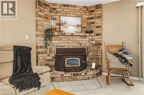 565 Stone Church Road W, Hamilton, ON - Indoor Photo Showing Other Room With Fireplace