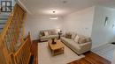 Virtually staged Living Room - 1098 Carding Mill Place, Mississauga, ON 