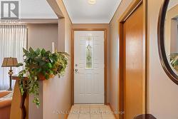 Front hall entry with coat closet. - 