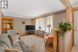 Large front window, updated flooring. - 