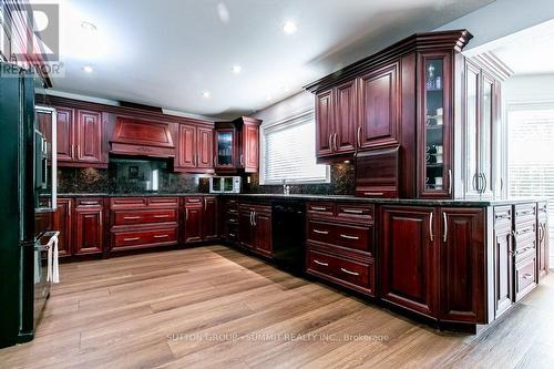 Cherry wood cabinets - 3739 St. Laurent Court, Mississauga, ON 