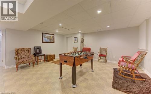 Finished basement space featuring recessed lighting and a drop ceiling - 599 Coldstream Drive, Waterloo, ON 