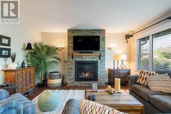 A welcoming gas fireplace in the living room - 