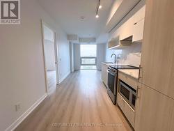 1205 - 100 QUEEN STREET E Toronto, ON M5C 0B5