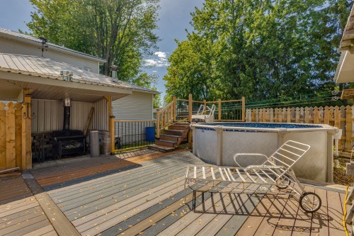 Cour - 756 Ch. De La Baie, Rigaud, QC - Outdoor With Above Ground Pool With Deck Patio Veranda