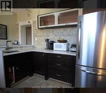 MAIN - 8 BOON AVENUE Toronto, ON M6E 3Z3