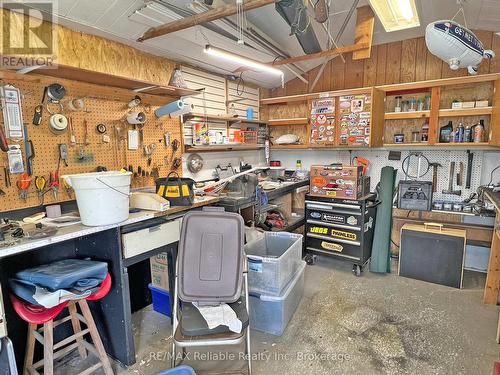 Workshop with shelving - 144 Sandbagger Crescent, Central Huron (Clinton), ON 