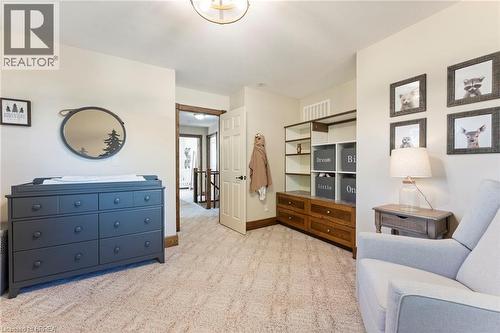 Neutral-toned walls complement the textured carpeting - 182 Governors Road E, Paris, ON 