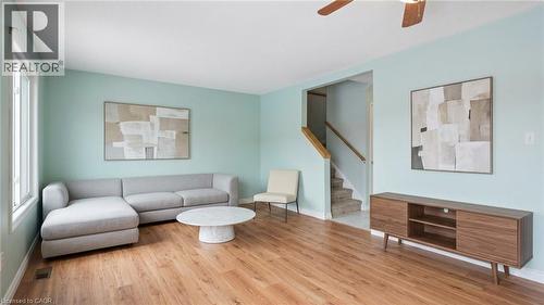 Virtually Staged Living Area - 817 Acadia Drive, Hamilton, ON - Indoor Photo Showing Living Room