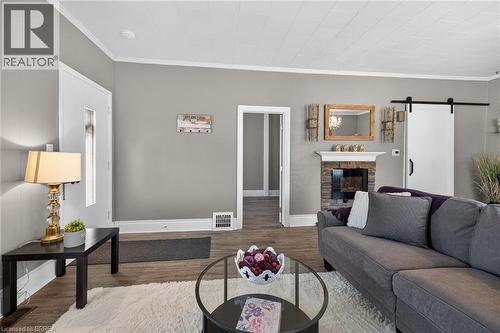 27 High Street, Brantford, ON - Indoor Photo Showing Living Room With Fireplace