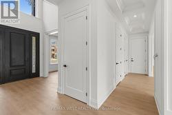 Main Floor Hall / Powder Room & Garage Acces - 