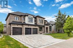 Interlock Driveway + 4 Car Garage ( Tandem ) - 