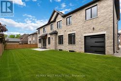 Backyard ( Garage Door ) - 