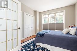Bright and airy main floor guest room. - 