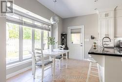 Breakfast nook and back door to BBQ deck. - 
