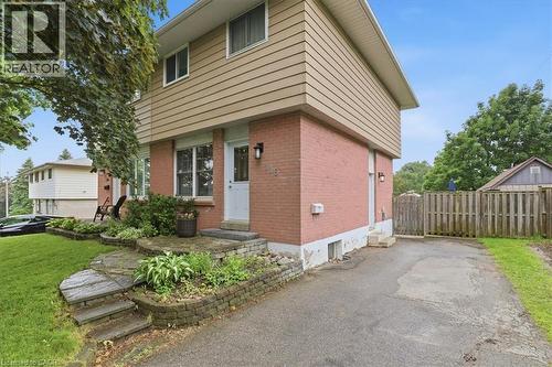 Exterior featuring brick and siding construction - 116 Scott Road, Cambridge, ON 