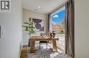 Bright room featuring a large window, recessed lighting, and light wood-finish flooring - 210 Heritage Drive Unit# Upper, Kitchener, ON 