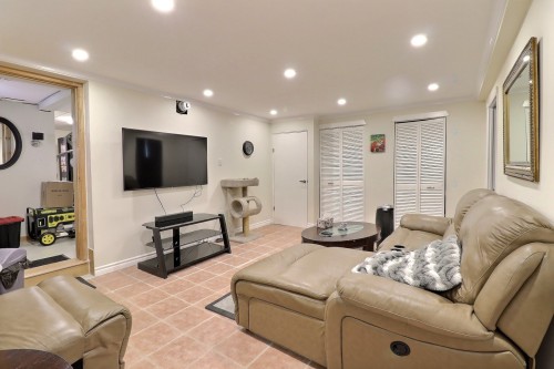 Family Room - 191 Rue Perron, Saint-David-De-Falardeau, QC 