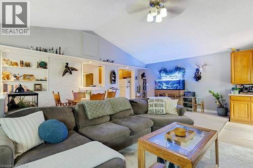 Apartment Vaulted ceiling living space with light wood-finish flooring, featuring recessed lighting and a ceiling fan - 3786 Old Beverly Road, North Dumfries, ON 