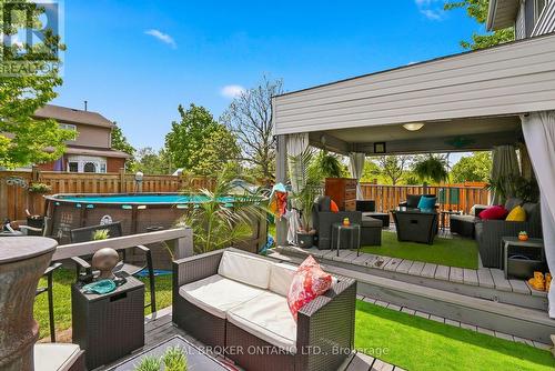 Large tiered deck overlooking pool & child play - 3260 Woodcroft Crescent, Burlington, ON 