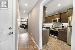 Hallway Leading to Kitchen, Dining, Living Room - 