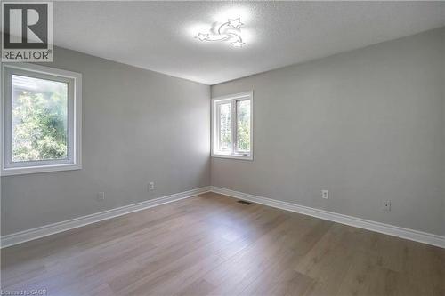 Room featuring light wood-finish flooring and crisp white baseboards - 2425 Nichols Drive, Oakville, ON - Indoor Photo Showing Other Room