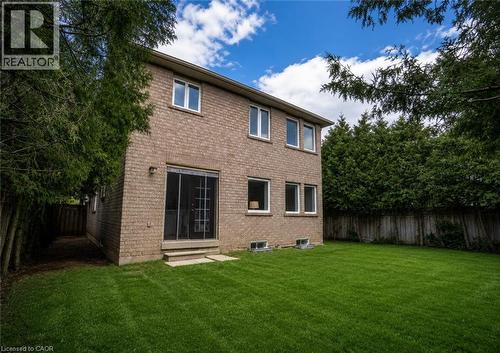 Two-story brick exterior with multiple windows - 2425 Nichols Drive, Oakville, ON - Outdoor