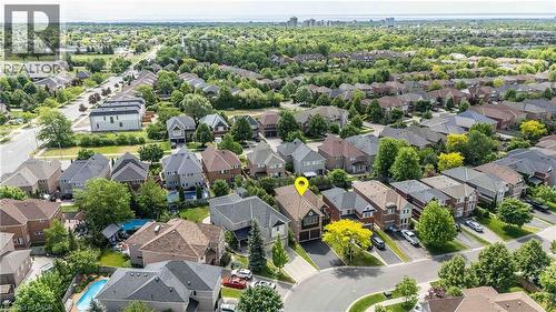 Aerial perspective of a residential neighborhood featuring diverse architectural styles and mature trees - 2425 Nichols Drive, Oakville, ON - Outdoor With View