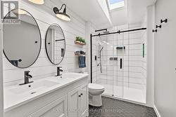 Updated main floor bathroom with skylight - 
