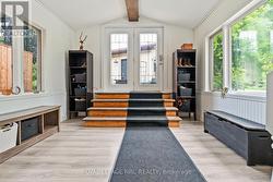 Separate entrance to lower level sunroom - 