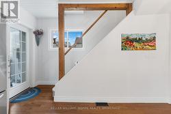 Open back stair way leads to the primary bedroom - 