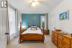 Primary bedroom captivates the natural light - 